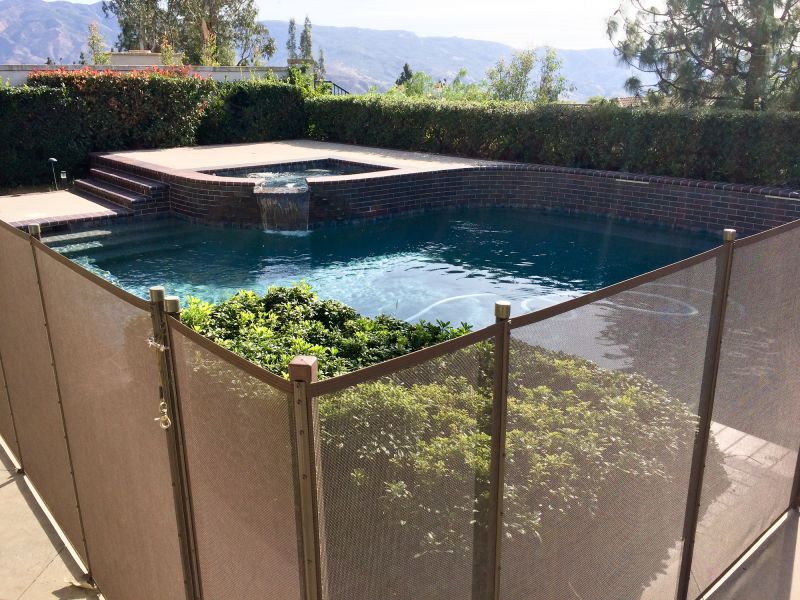Mesh Pool Safety Fence in Backyard